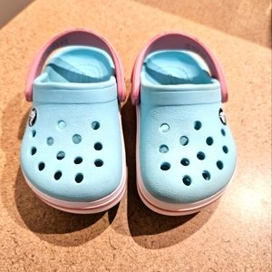 Crocs - toddler girl size 4 (teal and pink)